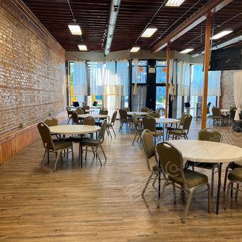 Beautiful , Spacious Event Venue with Exposed Brick and a Fish Tank